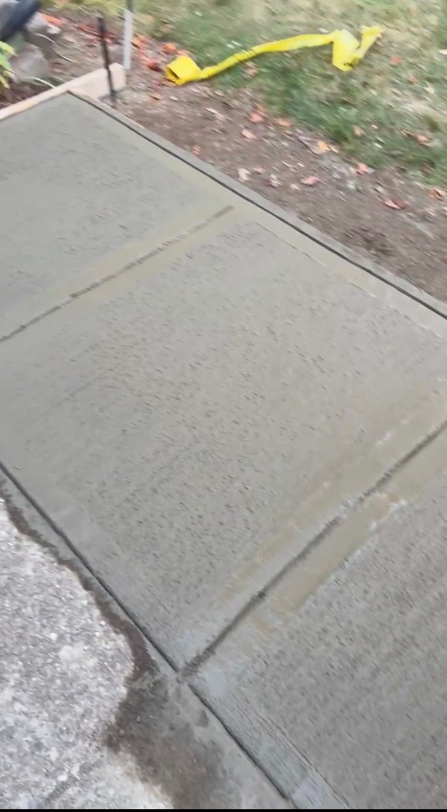 Concrete walkway with broom finish