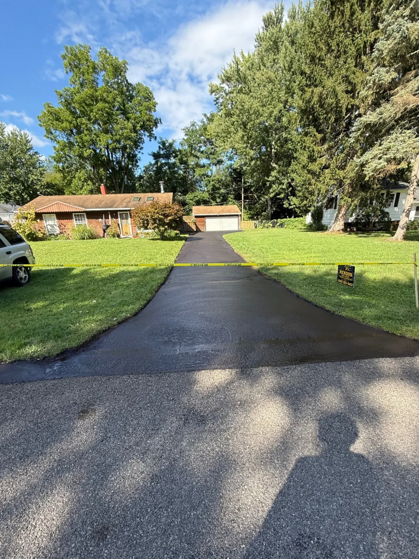 Freshly sealcoated asphalt driveway in Painesville, Ohio